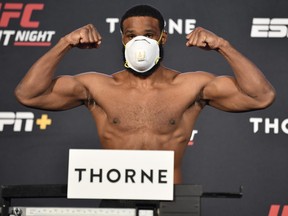 Tyron Woodley poses on the scale on May 29, 2020, during weigh ins for UFC Fight Night at the UFC APEX in Las Vegas.