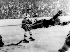 In this May 10, 1970, file photo, Boston Bruins' Bobby Orr goes into the air after scoring a goal against the St. Louis Blues that won the Stanley Cup for the Bruins, in Boston. Orr and the big, bad Boston Bruins swept the expansion-era Blues in that series. Now 49 years later, Boston is in its third final in nine seasons and St. Louis is back for the first time since 1970 (Ray Lussier/The Boston Herald via AP, File)