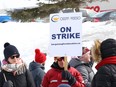 Teachers and support staff represented by the Ontario Secondary School Teachers' Federation take part in a one-day strike in Sudbury, Ont., on Friday, Feb. 28, 2020.