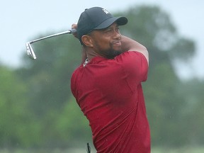 Tiger Woods plays a shot on the 15th hole during The Match: Champions For Charity at Medalist Golf Club on May 24, 2020, in Hobe Sound, Fla.
