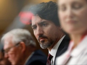 Prime Minister Justin Trudeau attends a news conference with government ministers on Parliament Hill in Ottawa May 1, 2020.