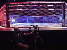 A member of the UFC staff looks on during UFC Fight Night at VyStar Veterans Memorial Arena on May 16, 2020 in Jacksonville, Florida.