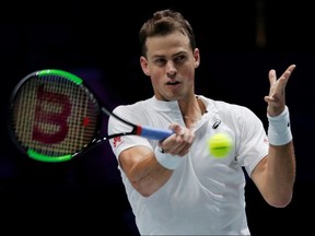 Canada's Vasek Pospisil in action during his Davis Cup match against Russia's Andrey Rublev.