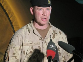 Lt.-Col. Craig Dalton, chief of staff for Task Force Kandahar, tells reporters in Kandahar, Afghanistan, that Canada has given command of Kandahar city to the U.S., Thursday, July 15, 2010.