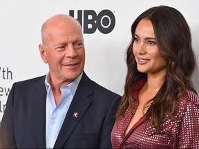 Bruce Willis (L) and wife Emma Heming Willis attend the premiere of "Motherless Brooklyn" during the 57th New York Film Festival at Alice Tully Hall on Oct. 11, 2019, in New York City.