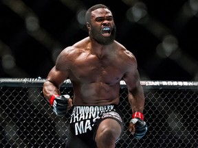 Tyron Woodley of USA celebrates after winning his welterweight fight against Dong Hyun Kim of South Korea during the UFC Fight Night at The Venetian Macao Cotai Arena on Aug. 23, 2014, in Macau, China.