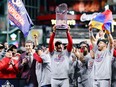 Manager Dave Martinez of the Washington Nationals hoists the Commissioners Trophy after defeating the Houston Astros 6-2 in Game 7 to win the 2019 World Series  at Minute Maid Park on Oct. 30, 2019 in Houston, Texas.