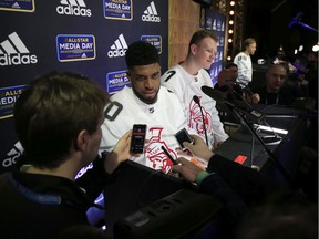 Anthony Duclair, left, and Brady Tkachuk of the Ottawa Senators speak to the press during media day for the 2020 NHL All-Star Game at Stifel Theatre on Jan. 23, 2020 in St Louis.