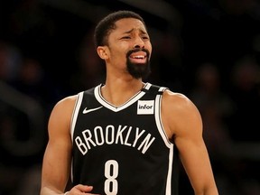 Spencer Dinwiddie of the Brooklyn Nets reacts after he is initially called for a foul in the second half against the New York Knicks at Madison Square Garden on January 26, 2020 in New York City.
