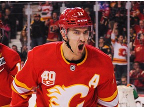 Mikael Backlund of the Calgary Flames celebrates after scoring a goal against the Boston Bruins during an NHL game at Scotiabank Saddledome on Feb. 21, 2020, in Calgary.