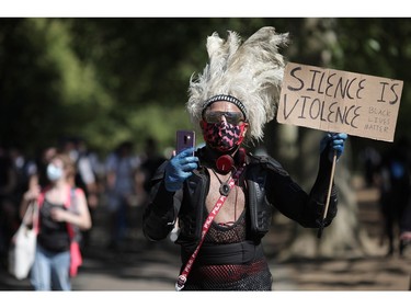 LONDON, ENGLAND - JUNE 01: Protesters take part in a 'Black Lives Matter' demonstration on June 01, 2020 in London, England. Protests and riots continue across American following the death of George Floyd, who died after being restrained by Minneapolis police officer Derek Chauvin. Chauvin, 44, was charged last Friday with third-degree murder and second-degree manslaughter.