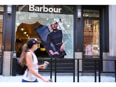 NEW YORK, NEW YORK - JUNE 01: Following a night of protests, broken windows and looted stores stand in Manhattans SoHo neighborhood on June 01, 2020 in New York City. Thousands of protesters took to the streets throughout the city to continue to show anger at Minneapolis Police officer Derek Chauvin who was filmed kneeling on George Floyd's neck before he was later pronounced dead at a local hospital. Floyd's death, the most recent in a series of deaths of black Americans while in police custody, has set off days and nights of protests across the country.