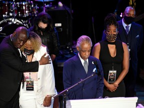 Reverend Al Sharpton leads a moment of silence during a memorial service for George Floyd, who died in Minneapolis police custody, in Minneapolis, Minnesota, June 4, 2020.