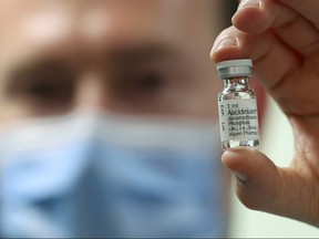 A pharmacist displays an ampoule of dexamethasone at the Erasme Hospital amid the COVID-19 outbreak, in Brussels, Belgium, June 16, 2020.
