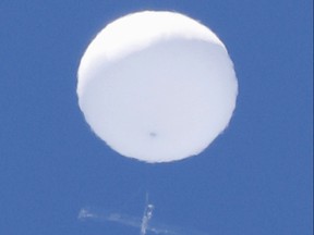 A balloon-like white object in the sky is pictured in Sendai, Japan in this photo taken by Kyodo June 17, 2020.