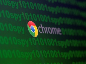 Google Chrome logo is seen near cyber code and words "spy"  in this illustration picture taken June 18, 2020.