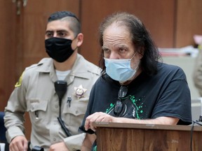 Adult film star Ron Jeremy, who has been charged with raping three women and sexually assaulting a fourth in incidents in West Hollywood from 2014 to 2019, makes his first appearance in Los Angeles County Superior Court, Calif.,  June 23, 2020.