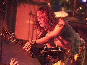 Justin Hawkins, lead singer for The Darkness, gets fan reaction at The Phoenix.