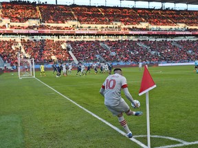 Toronto FC forward Alejandro Pozuela (10) takes a corner kick against New York City before the Major League Soccer season was suspended in March. Pozuelo and the Reds will be back next month, when MLS starts a tournament in Orlando.