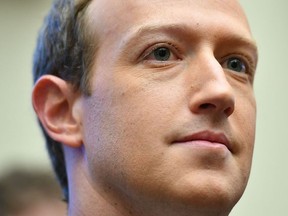 In this file photo Facebook Chairman and CEO Mark Zuckerberg arrives to testify before the House Financial Services Committee on "An Examination of Facebook and Its Impact on the Financial Services and Housing Sectors" in the Rayburn House Office Building in Washington, DC on October 23, 2019.