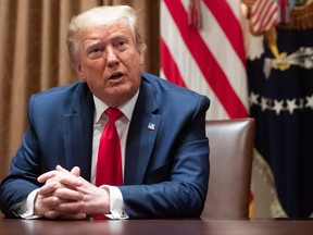 U.S. President Donald Trump holds a roundtable discussion with African American leaders in the Cabinet Room of the White House in Washington, D.C., June 10, 2020.