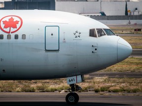 An Air Canada plane prepares to take off at the Benito Juarez International airport, in Mexico City, amid the COVID-19 pandemic, May 20, 2020.