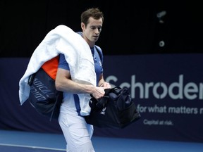 Andy Murray leaves the court following a defeat during his semifinal match against Dan Evans on Day 5 of Schroders Battle of the Brits at the National Tennis Centre in London, England, Saturday, June 27, 2020 .