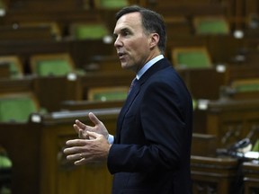 Finance Minister Bill Morneau rises during a meeting of the Special Committee on the COVID-19 pandemic in the House of Commons on Parliament Hill in Ottawa, on Wednesday, June 17, 2020.