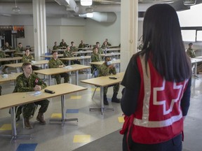 Members of the Canadian Armed Forces take part in a training session before deploying to senior's residences April 29, 2020 in Montreal.