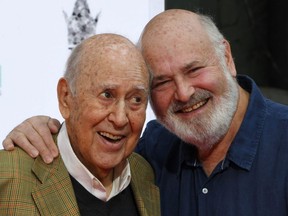 Carl Reiner (left) and his son Rob Reiner are honoured with a hand and footprint ceremony at the TCL Chinese Theatre IMAX in Hollywood, Calif., April 7, 2017.