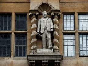 A statue of Cecil Rhodes, a controversial historical figure, is seen outside Oriel College in Oxford, Britain, June 11, 2020.
