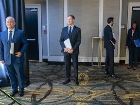 Conservative Party of Canada leadership candidates Erin O’Toole, left to right, Peter MacKay, Derek Sloan and Leslyn Lewis wait for the start of the French Leadership Debate in Toronto on Wednesday, June 17, 2020.