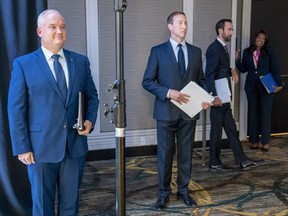 Conservative Party of Canada leadership candidates Erin O'Toole, left to right, Peter MacKay, Derek Sloan and Leslyn Lewis wait for the start of the French Leadership Debate in Toronto on Wednesday, June 17, 2020.