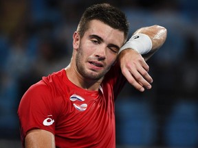 In this file photograph taken on January 8, 2020, Borna Coric of Croatia reacts during his match against Diego Schwartzman at the ATP Cup in Sydney.