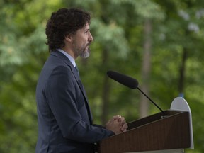 Prime Minister Justin Trudeau pauses before responding to a question on racism in the United States during a news conference outside Rideau Cottage in Ottawa, Tuesday, June 2, 2020.