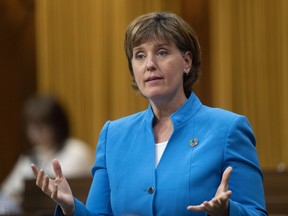 Minister of Agriculture and Agri-Food Minister Marie-Claude Bibeau rises during Question Period Tuesday May 26, 2020 in Ottawa. The federal government is freeing up more funds to help food banks and other community organizations working to increase food security.