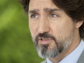 Prime Minister Justin Trudeau speaks during a news conference outside Rideau cottage in Ottawa, Thursday, June 4, 2020.