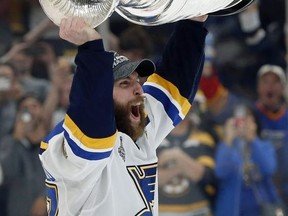St. Louis Blues' Alex Pietrangelo hoists the Stanley Cup after the Blues defeated the Boston Bruins in Game 7 of the NHL Stanley Cup Final, June 12, 2019, in Boston.