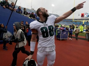Eagles tight end Dallas Goedert signals to a fan after an NFL game against the Bills at New Era Field in Orchard Park, N.Y., on Oct. 27, 2019.
