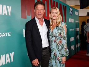 Dennis Quaid and fiancee Laura Savoie arrive at the "Midway" Special Screening at Joint Base Pearl Harbor-Hickam on October 20, 2019 in Honolulu.