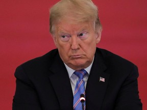 U.S. President Donald Trump listens during a meeting of the American Workforce Policy Advisory Board in the East Room at the White House in Washington, D.C., Friday, June 26, 2020.
