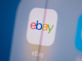 In this file photo taken on July 24, 2019 this illustration picture in Paris shows the logo of eBay on the screen of a tablet.