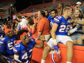 Florida Gators players celebrate following a victory over the Charleston Southern Buccaneers at Ben Hill Griffin Stadium on September 1, 2018 in Gainesville, Florida.