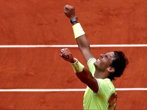 Spain's Rafael Nadal celebrates after beating Austria's Dominic Thiem in the 2019 French Open final.
