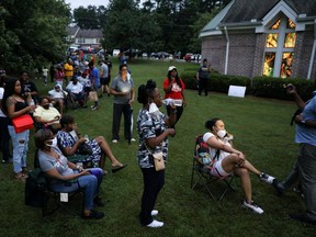 Voters line up at Christian City, an assisted living home, to cast their ballots after Democratic and Republican primaries were delayed due to coronavirus disease (COVID-19) restrictions in Union City, Georgia June 9, 2020. REUTERS/Dustin Chambers     TPX IMAGES OF THE DAY ORG XMIT: GGG-ATL104