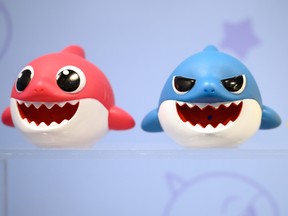 A selection of "Baby Shark" toys are seen on a display at the annual "Toy Fair" at Olympia London on Jan. 22, 2019 in London.
