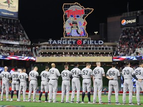 The New York Yankees line up prior to game three of the American League Division Series against the Minnesota Twins at Target Field on Oct. 7, 2019 in Minneapolis, Minn.