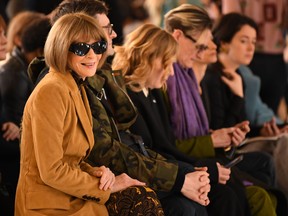 Vogue chief editor Anna Wintour takes her seat in the front row for the catwalk show by fashion house Victoria Beckham during their Autumn/Winter 2020 collection on the third day of London Fashion Week in London on Feb. 16, 2020.