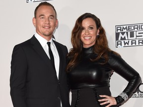 Recording artists Souleye, left, and Alanis Morissette attend the 2015 American Music Awards at the Microsoft Theater at L.A. Live in Los Angeles, Calif., Nov. 22, 2015.