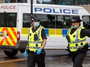 Police monitor in George Square, Glasgow on Saturday, June 27, 2020, after reports that a loyalist demonstration was due to take place following a stabbing incident at the Park Inn Hotel the previous day.